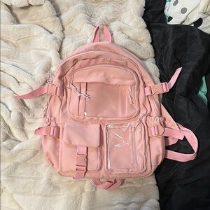 Pink Backpack with Multiple Pockets
